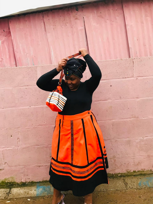 Umbhaco wrap skirt with orange lines